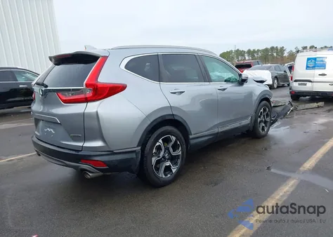 2019 Honda Cr-V Touring from USA, damaged, VIN 7FARW1H94KE007315